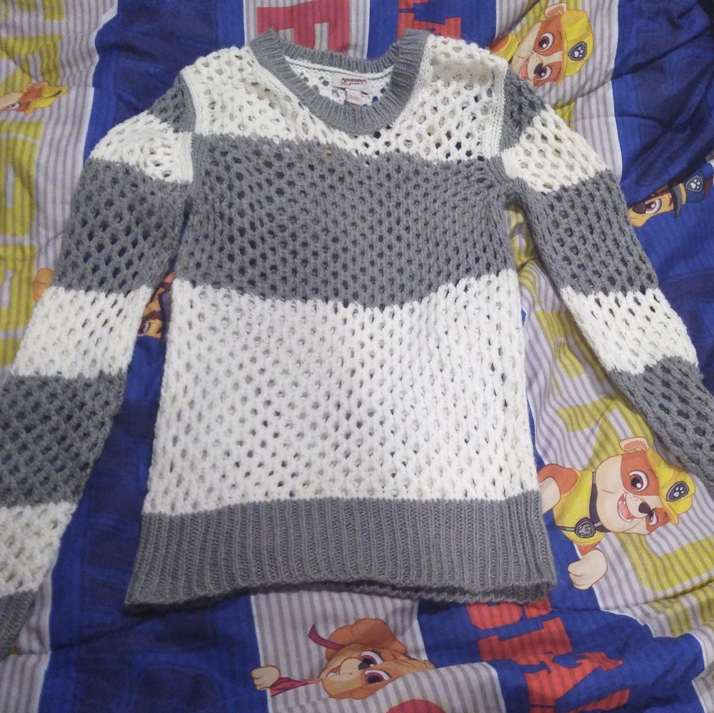 Gray and white sweater